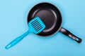 Kitchen utensils isolated on blue background Royalty Free Stock Photo