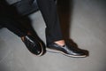 Stylish leather men`s shoes on foot Royalty Free Stock Photo