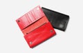 Stylish leather wallets on white background