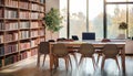 Stylish library interior with work tables in row and bookshelf, panoramic window