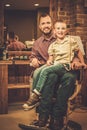 Stylish little boy and his father Royalty Free Stock Photo
