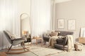 Stylish living room interior with large mirror, comfortable sofa and rocking chair Royalty Free Stock Photo