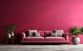 stylish living room interior with a sofa, green indoor plants on the background of a pink wall, minimalist design Royalty Free Stock Photo