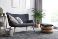 Stylish living room with modern furniture and stylish decor Royalty Free Stock Photo