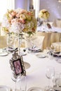 Stylish and luxuriously designed dining table for guests at the event.wedding composition. wedding decor, Royalty Free Stock Photo