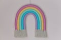 Stylish macrame rainbow decoration for baby room. Wall