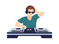 Stylish male DJ in headphones play electronic music on controller vector flat illustration. Fashionable musician in