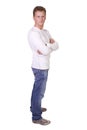 Stylish male model standing with arms crossed