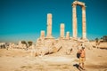 Stylish male tourist with backpack visit and exploring historic attraction. Man enjoy summer vacation. Sightseeing tour. Tourism i Royalty Free Stock Photo