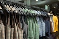 Stylish male vests on hangers in the row. a lot of beatiful vests in a row Royalty Free Stock Photo