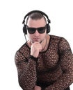 Stylish man in a stylish dark glasses listening to music. Royalty Free Stock Photo
