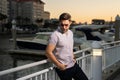 Stylish man wearing sunglasses and shirt. Handsome man outdoors portrait. Portrait of stylish male model outdoor Royalty Free Stock Photo