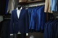 Stylish men`s suit. Men`s jacket on a mannequin. Men`s Clothing. Mannequins in the window of the boutique. Clothing store. Shoppin Royalty Free Stock Photo