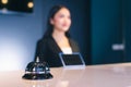 Stylish metal bell for calling a bartender or waiter on the bar counter Royalty Free Stock Photo