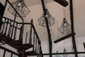 Metal pendant lamps with light bulbs indoors