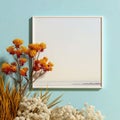 Minimalist White Frame Mockup with Protea and Dried Flowers on Blue Wall Royalty Free Stock Photo