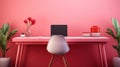 Stylish minimalist monochrome interior of modern office room in pastel carmine red and pink tones. Large desk, laptop Royalty Free Stock Photo