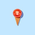 Stylish mockup with tomato in an ice cream waffle cone on a pastel blue background. Creative healthy food concept. copy