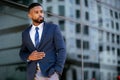 Stylish modern african american businessman, commercial model posing in trendy suit outfit, handsome executive Royalty Free Stock Photo