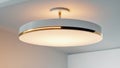Stylish Modern Ceiling Lamp with Warm Ambient Lighting. Royalty Free Stock Photo