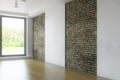 Empty Interior Room with Window and Old Brick Wall Royalty Free Stock Photo