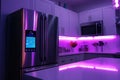 Stylish Modern Kitchen with Purple LED Lighting and Smart Fridge and Appliences Royalty Free Stock Photo