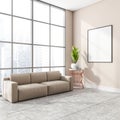 Stylish modern office room interior in skyscraper building with design leather couch, white mock up framed poster, tile ceramic Royalty Free Stock Photo