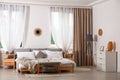 Stylish modern room interior with bed Royalty Free Stock Photo