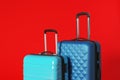 Stylish modern suitcases with handles on color