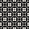 Stylish monochrome geometric texture with smooth perforated shapes, rounded crosses, circles, squares, repeat tiles. Royalty Free Stock Photo