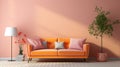 Stylish monochrome interior of modern cozy living room in pastel orange and pink tones. Trendy couch with cushions Royalty Free Stock Photo