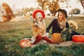 Family with pumpkins Royalty Free Stock Photo
