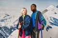 stylish multicultural couple in vibrant clothes