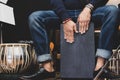 Stylish musician playing the Cajon drums. Royalty Free Stock Photo