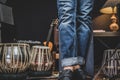 Stylish musician playing the Cajon drums. Royalty Free Stock Photo