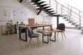 Stylish office interior with large table