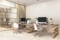 Stylish office with wooden tables with bronze legs, white chairs and separate cabinet behind a glass wall Royalty Free Stock Photo