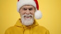 Stylish old man gesticulating in studio. Happy guy looking camera indoors. Royalty Free Stock Photo