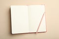 Stylish open notebook and pencil on beige, top view Royalty Free Stock Photo