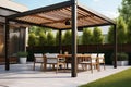 Stylish outdoor living space with modern patio furniture, pergola shade structure, and dining ensemble Royalty Free Stock Photo