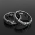 Stylish pair of steel rings. Couple of rings