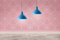 Pendant lamps hanging near pink wall in room Royalty Free Stock Photo