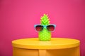 Stylish pineapple candle with sunglasses