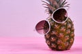 Stylish pineapple in sunglasses and text space.