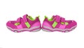 Pink children`s sneakers.