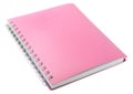 Stylish pink spiral notebook on white