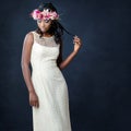 Stylish portrait of african bride with flower crown. Royalty Free Stock Photo