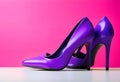 Stylish purple high heels on color background