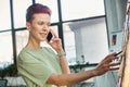 stylish queer person talking on mobile Royalty Free Stock Photo