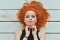 Portrait of stylish redhead young woman posing Royalty Free Stock Photo